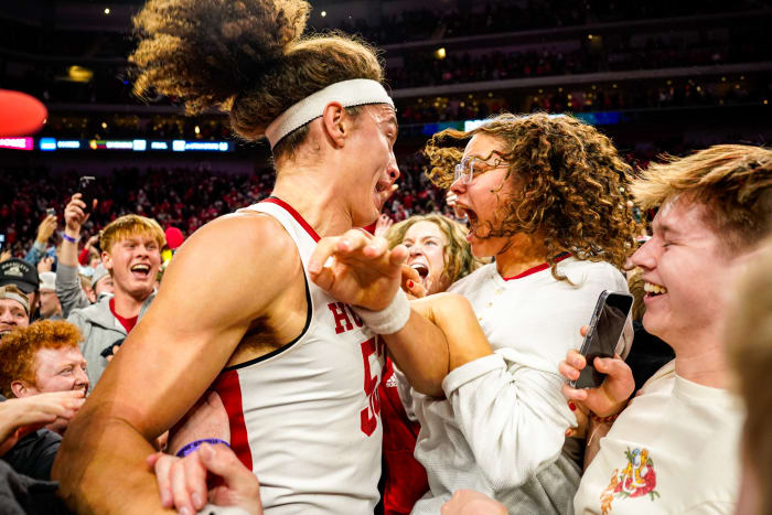 Nebraska forward Josiah Allick celebrates with fans after the Huskers' upset win Tuesday night over Purdue at Pinnacle Bank Arena in Lincoln. (Jan 9, 2024)